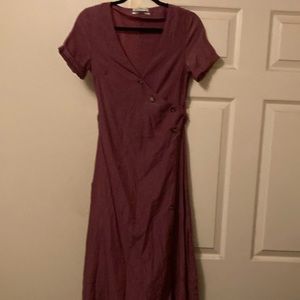 pretty mauve color, buttons down side very nice open leg look